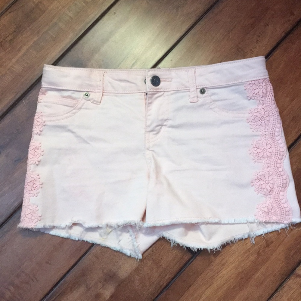 Girls pink shorts with side details